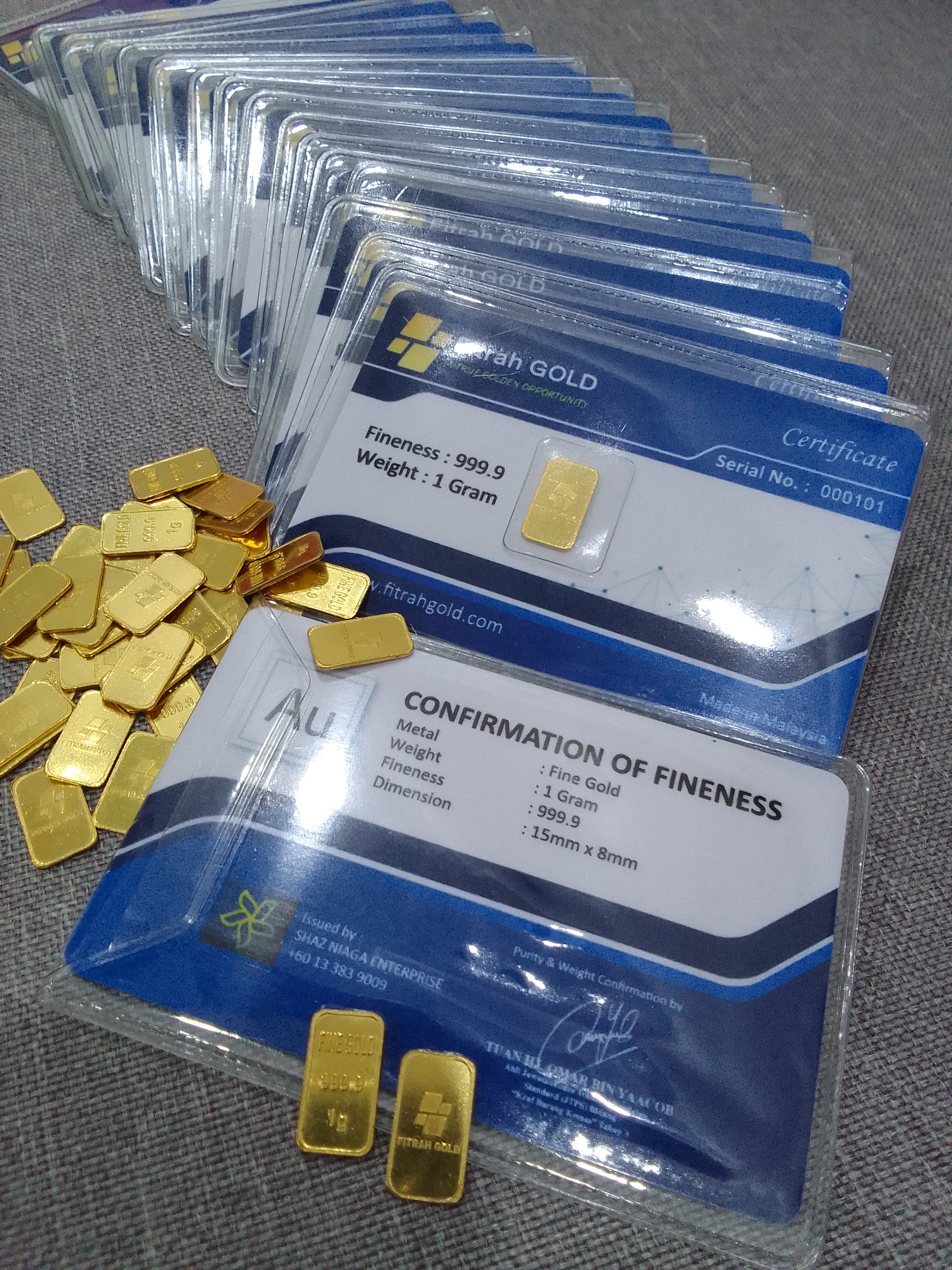 Koleksi produk rasmi Fitrah Gold untuk simpanan fizikal dan perancangan masa hadapan